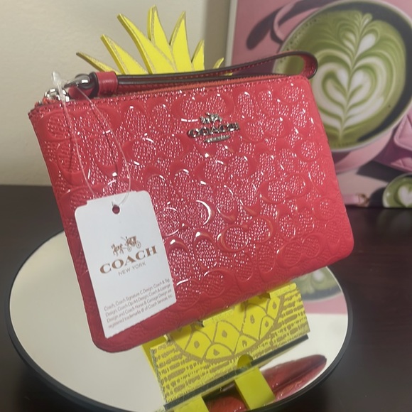 NWT Coach Wristlet raised C’s in strawberry color - Picture 3 of 7